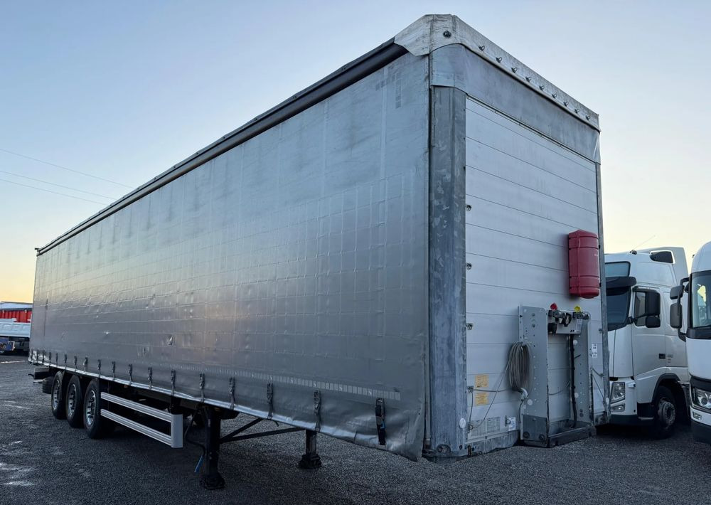 Schmitz Cargobull OSIE SCHMITZ PODNOSZONA OSIE - Curtainsider semi-trailer: picture 3 Schmitz Cargobull OSIE SCHMITZ PODNOSZONA OSIE - Curtainsider semi-trailer: picture 3