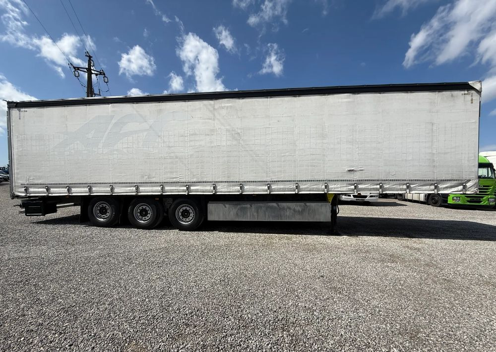 Schmitz Cargobull OSIE SCHMITZ PODNOSZONE OSIE - Curtainsider semi-trailer: picture 4 Schmitz Cargobull OSIE SCHMITZ PODNOSZONE OSIE - Curtainsider semi-trailer: picture 4