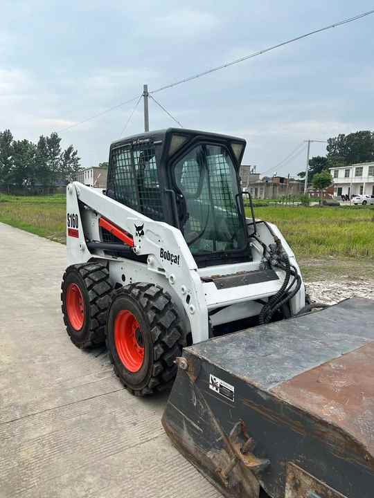 USED BOBCAT S160 Skid-steer Loader Bobcat S160 Carry Sweeper with Very Good Performance Is for Sale at a Low Price. - Skid steer loader: picture 2 USED BOBCAT S160 Skid-steer Loader Bobcat S160 Carry Sweeper with Very Good Performance Is for Sale at a Low Price. - Skid steer loader: picture 2