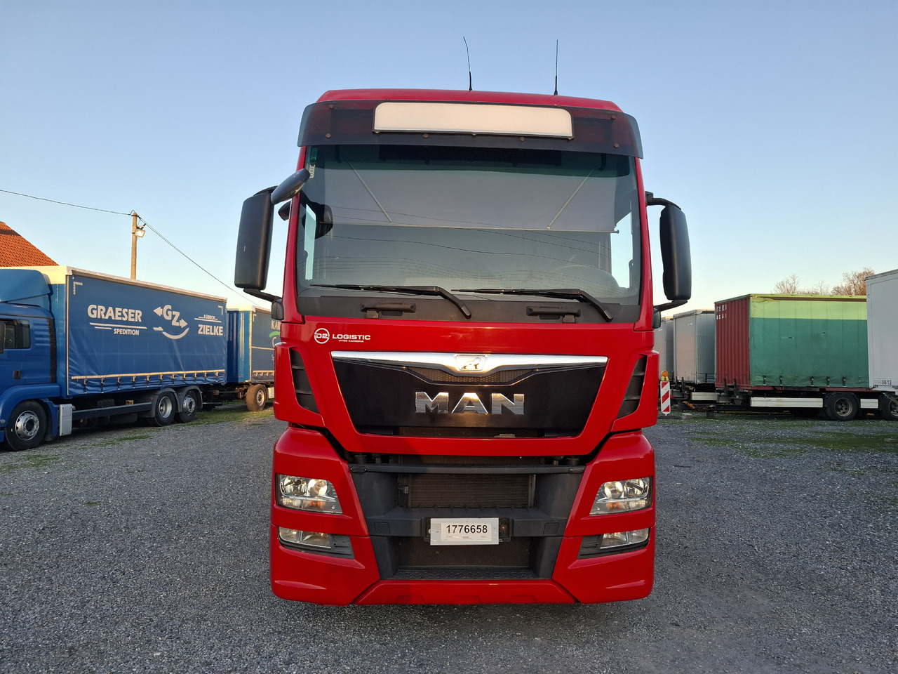 MAN TGX 26.440 E6 + SCHMITZ - Curtainsider truck: picture 2 MAN TGX 26.440 E6 + SCHMITZ - Curtainsider truck: picture 2