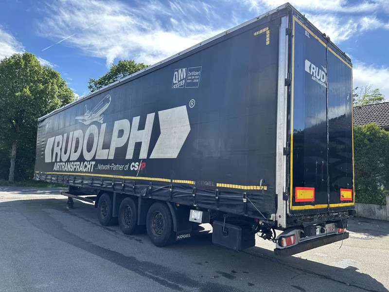 Kögel MEGA Tautliner mit ROLLENBETT Flughafentr. MEGA Tautliner mit ROLLENBETT Flughafentr. - Closed box semi-trailer: picture 3 Kögel MEGA Tautliner mit ROLLENBETT Flughafentr. MEGA Tautliner mit ROLLENBETT Flughafentr. - Closed box semi-trailer: picture 3
