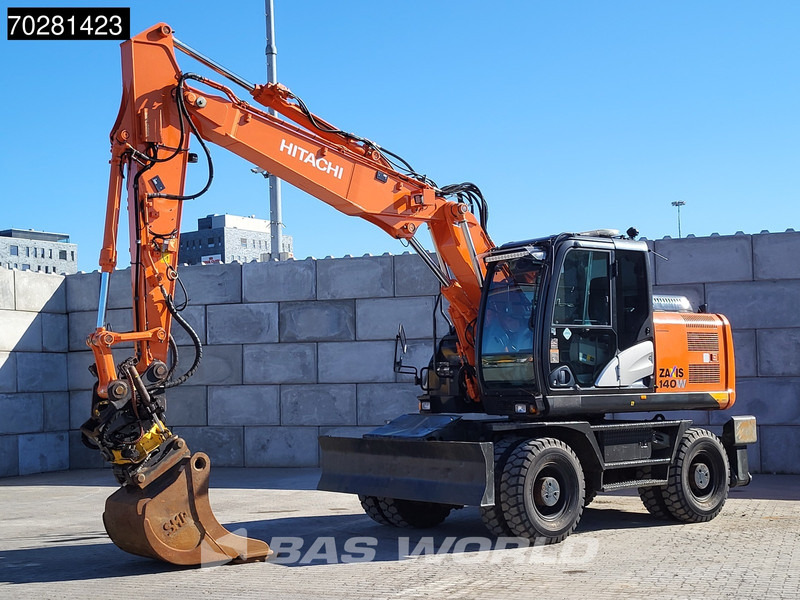 Hitachi ZX140W -5 OUTRIGGERS + BLADE - Wheel excavator: picture 2 Hitachi ZX140W -5 OUTRIGGERS + BLADE - Wheel excavator: picture 2