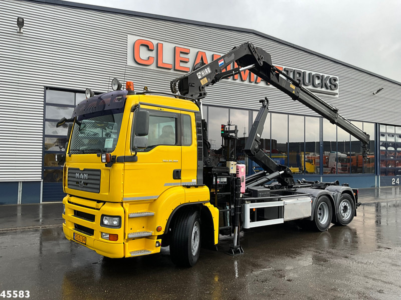 MAN TGA 26.360 Hiab 16 Tonmeter laadkraan - Hook lift truck, Crane truck: picture 1 MAN TGA 26.360 Hiab 16 Tonmeter laadkraan - Hook lift truck, Crane truck: picture 1