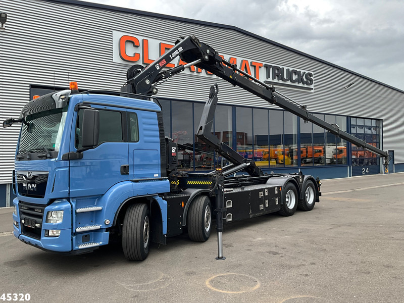 MAN TGS 35.500 8x4 Euro 6 Hiab 30 Tonmeter laadkraan Just 164.946 km! - Hook lift truck, Crane truck: picture 1 MAN TGS 35.500 8x4 Euro 6 Hiab 30 Tonmeter laadkraan Just 164.946 km! - Hook lift truck, Crane truck: picture 1