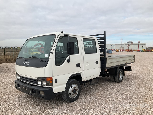 2006 Isuzu NPR77 4x2 Crew Cab Flatbed Truck - Dropside/ Flatbed truck: picture 1 2006 Isuzu NPR77 4x2 Crew Cab Flatbed Truck - Dropside/ Flatbed truck: picture 1