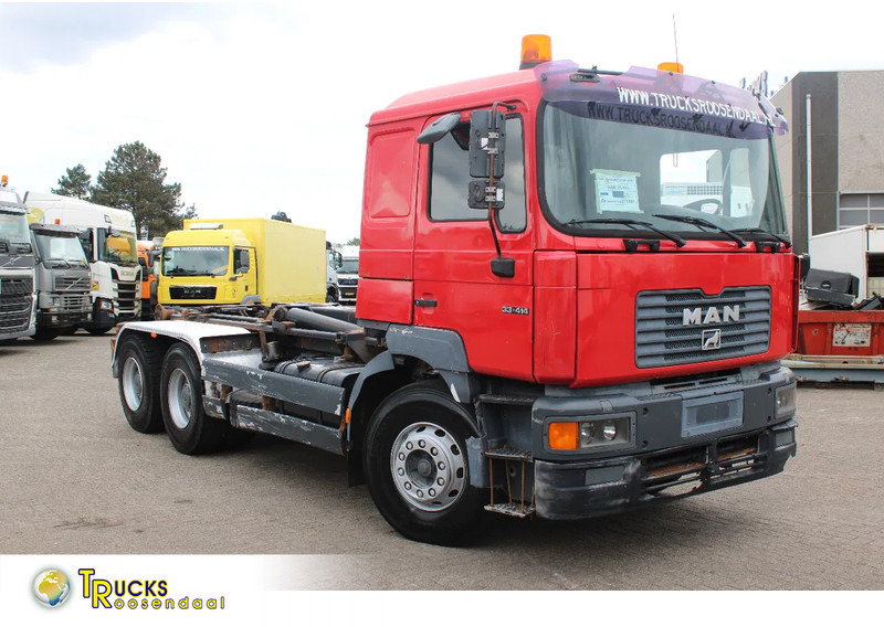 MAN 33 .414 + 6x4 + EURO 2 + spring + manual+ palfinger hooksystem - Hook lift truck: picture 1 MAN 33 .414 + 6x4 + EURO 2 + spring + manual+ palfinger hooksystem - Hook lift truck: picture 1
