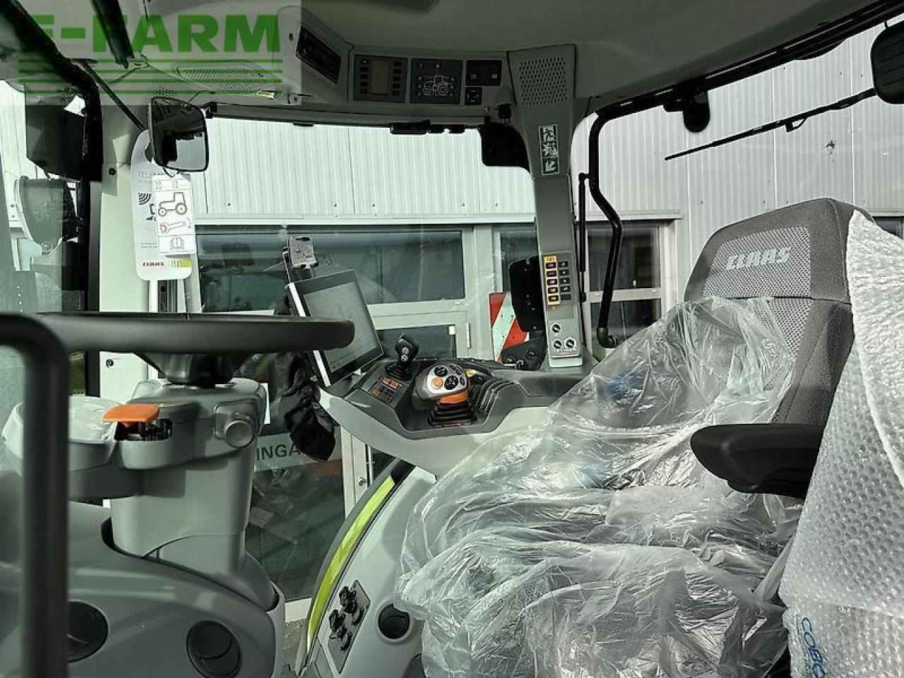 CLAAS arion 660 cebis cmatic CMATIC CEBIS - Farm tractor: picture 4 CLAAS arion 660 cebis cmatic CMATIC CEBIS - Farm tractor: picture 4