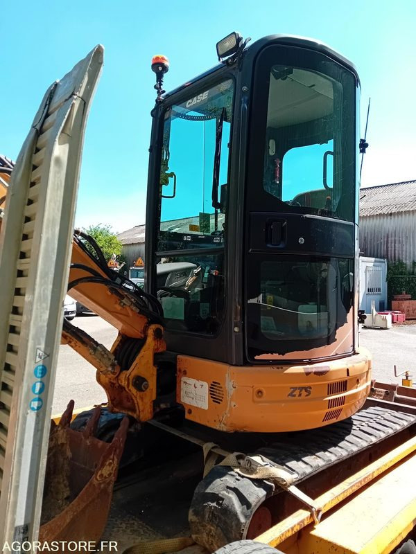 Mini-pelle CASE -2009, et sa remorque - Excavator: picture 1 Mini-pelle CASE -2009, et sa remorque - Excavator: picture 1