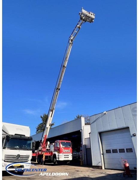 MAN TGA 26.350 Magirus ALP 320L = 32 meter, Waterpomp, 6x4, Bladgeveerd - Fire truck: picture 1 MAN TGA 26.350 Magirus ALP 320L = 32 meter, Waterpomp, 6x4, Bladgeveerd - Fire truck: picture 1