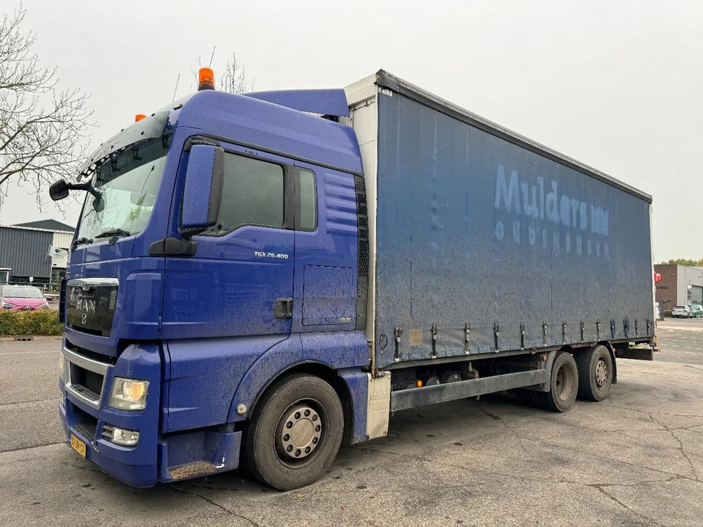 MAN TGX 26.400 6X2 - EURO 4 + LIFT + STEERING AXLE + - Curtainsider truck: picture 1 MAN TGX 26.400 6X2 - EURO 4 + LIFT + STEERING AXLE + - Curtainsider truck: picture 1
