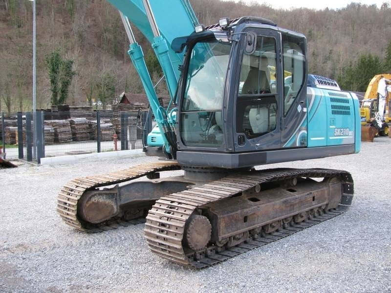 Kobelco SK210NLC-10 Vsa oprema TOP stanje - Crawler excavator: picture 2 Kobelco SK210NLC-10 Vsa oprema TOP stanje - Crawler excavator: picture 2