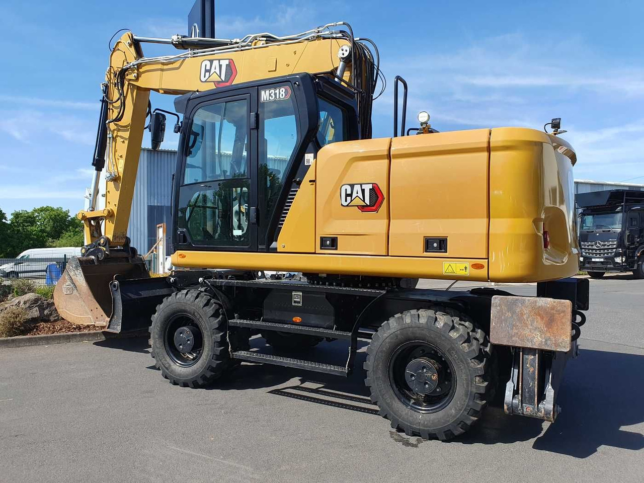 CAT M318 / 2022 / nur 286h! / Tieflöffel / Pratzen - Wheel excavator: picture 3 CAT M318 / 2022 / nur 286h! / Tieflöffel / Pratzen - Wheel excavator: picture 3