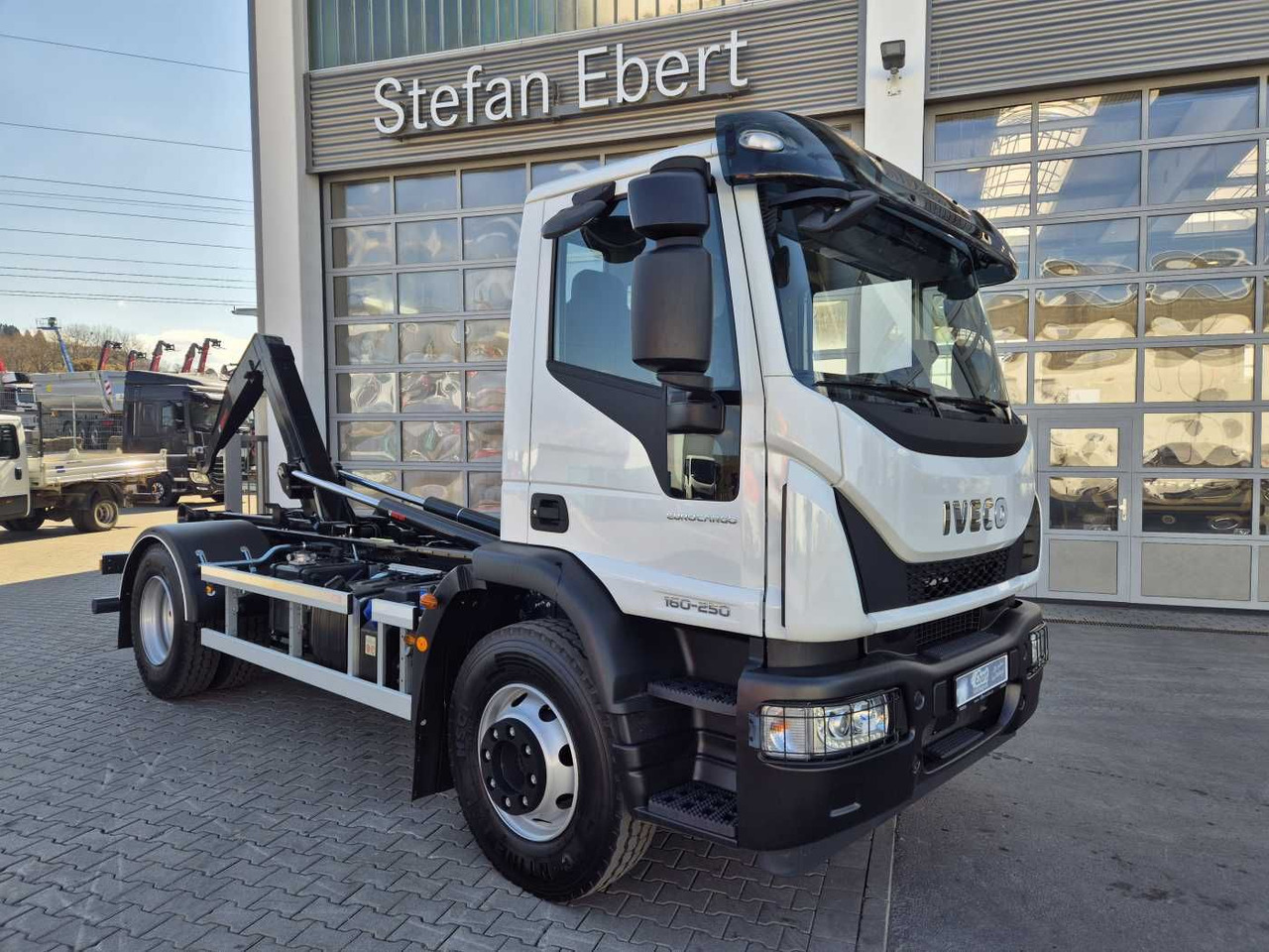 Iveco Eurocargo ML160E25/P HIAB Multilift XR10S4150 - Hook lift truck: picture 1 Iveco Eurocargo ML160E25/P HIAB Multilift XR10S4150 - Hook lift truck: picture 1