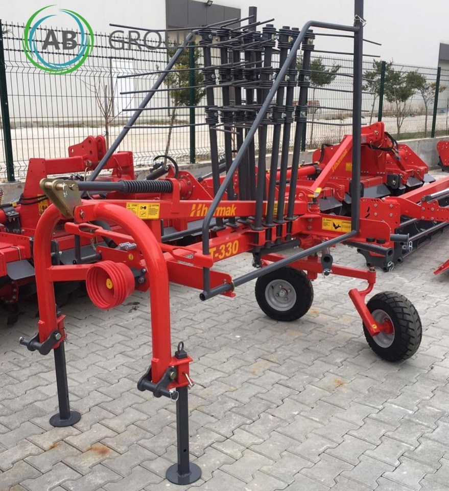 Harmak HT- 330 rotary rake - Tedder/ Rake: picture 1 Harmak HT- 330 rotary rake - Tedder/ Rake: picture 1