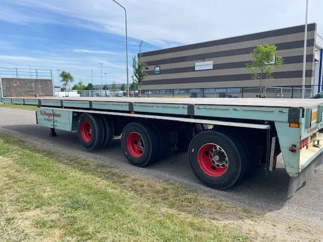 Floor open oplegger ,stuurassen, uitschuifbaar 20 mtr met stalen bodem/frame. kranenprofiel. - Dropside/ Flatbed semi-trailer: picture 4 Floor open oplegger ,stuurassen, uitschuifbaar 20 mtr met stalen bodem/frame. kranenprofiel. - Dropside/ Flatbed semi-trailer: picture 4